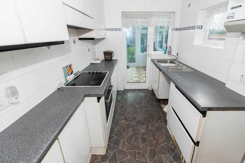 56 Gomshall Avenue, Wallington, SM6 8NY