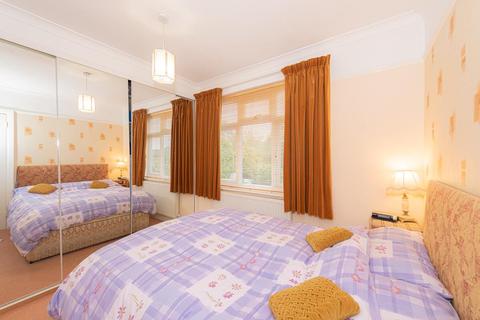 123 Walsingham Gardens, Epsom, KT19 0LZ