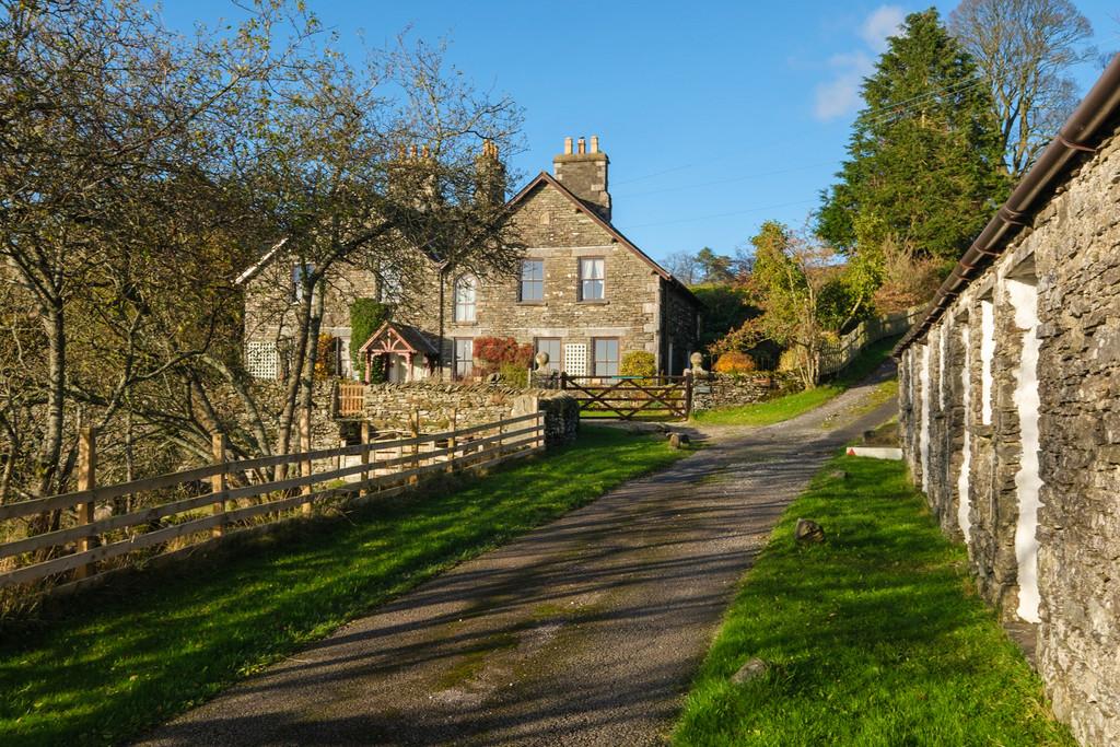 Driveway, stables and house