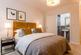 The main bedroom features an en suite shower room