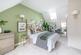 The main bedroom is spread across a whole floor and features an en suite