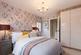 The main bedroom features an en suite shower room