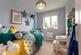 Bedroom 3 is well-suited to a child or even a home office