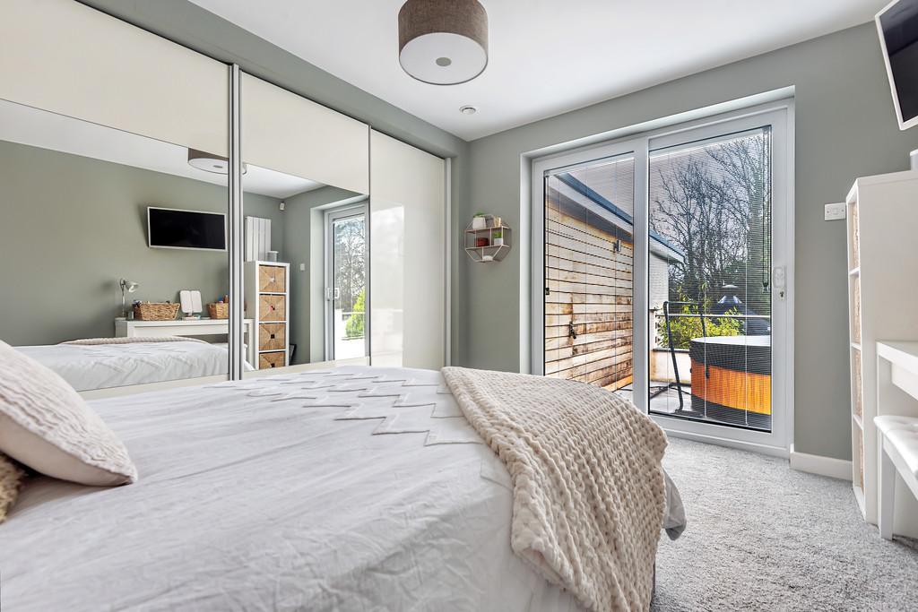 Bedroom 1 with sliding doors to terrace