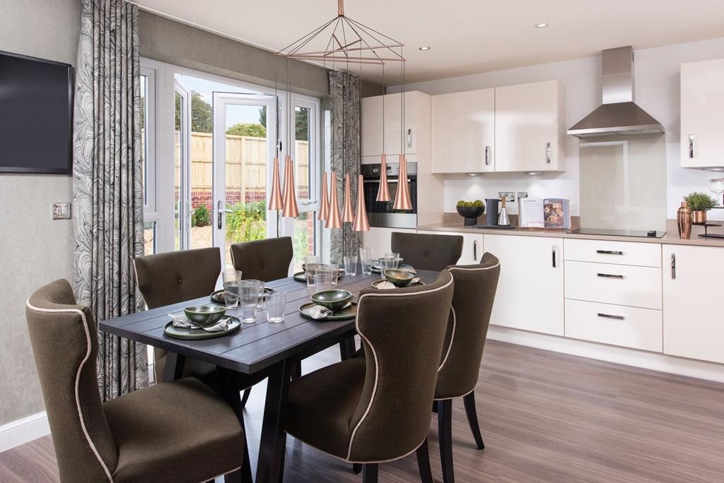 Open plan kitchen dining space in the Hale housetype with french doors opening out to the rear garde