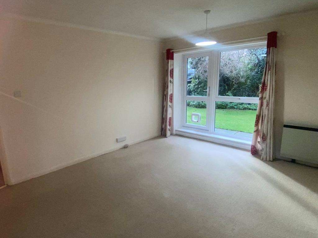 Living Room with door to patio and communal gardens