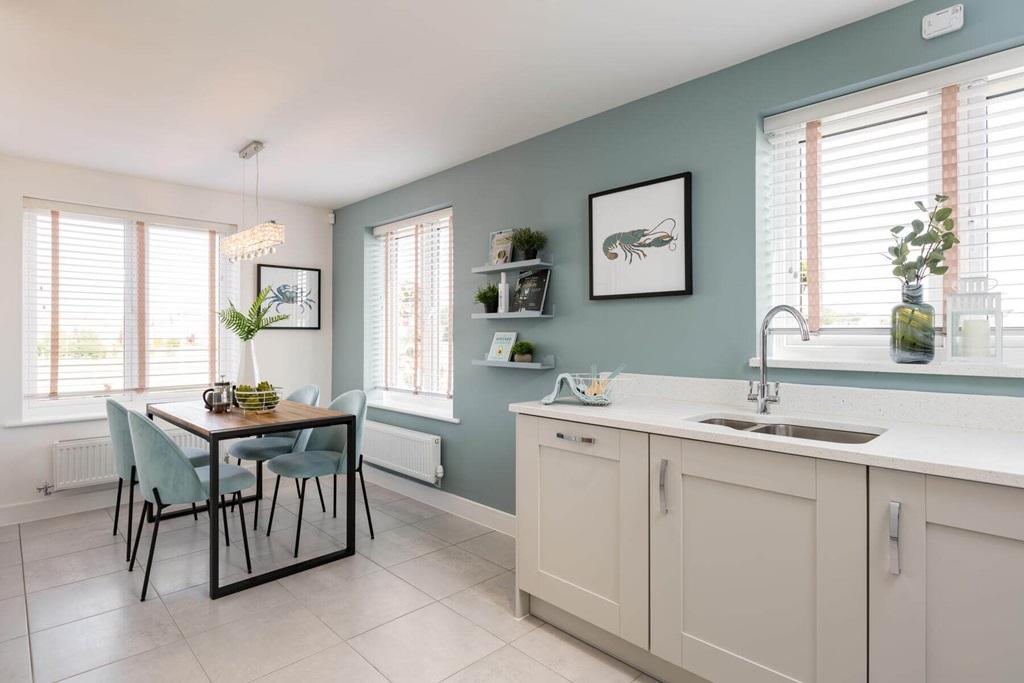 An open plan kitchen and dining area is perfect for entertaining family and friends