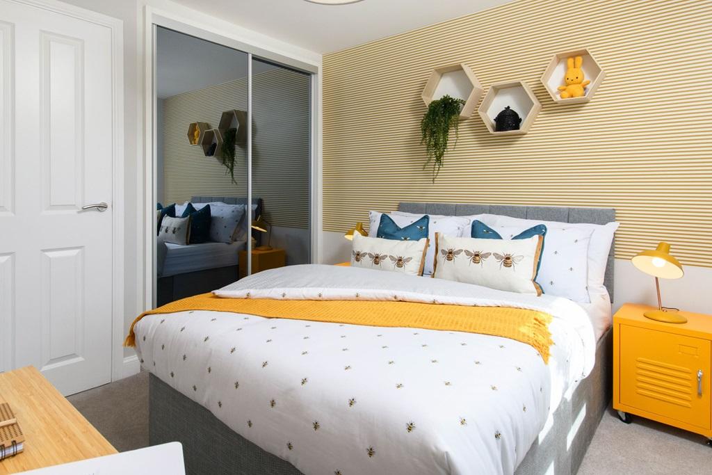 Double bedroom with built-in storage in Millford style home
