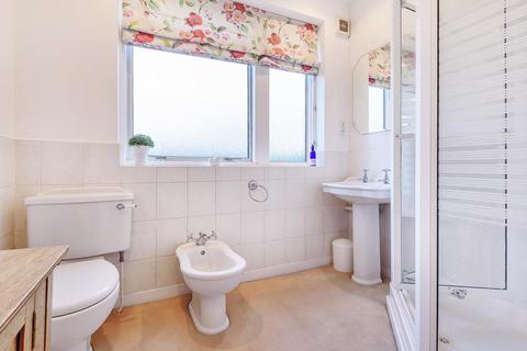 8 Crossway, London, SW20 9JA