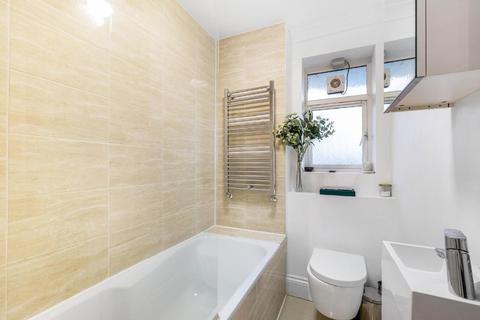116 Whitlock Drive, London, SW19 6SN