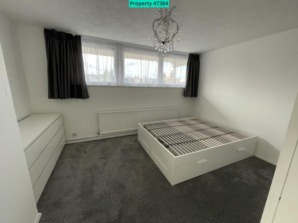Bedroom with carpet