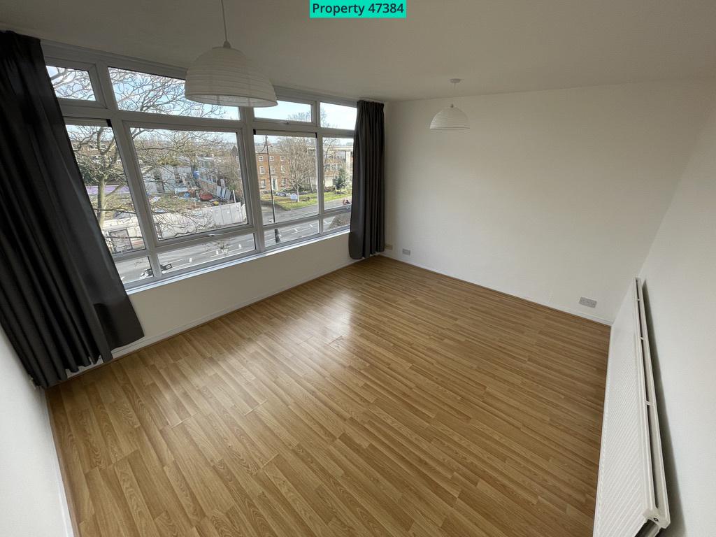 Bright and spacious lounge with curtains
