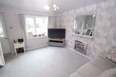 61 Turnberry Drive, Wilmslow, SK9 2QW