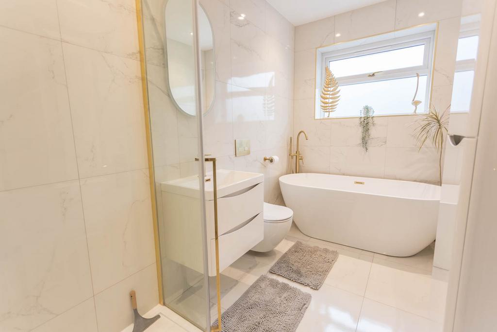 Bathroom with shower and bath