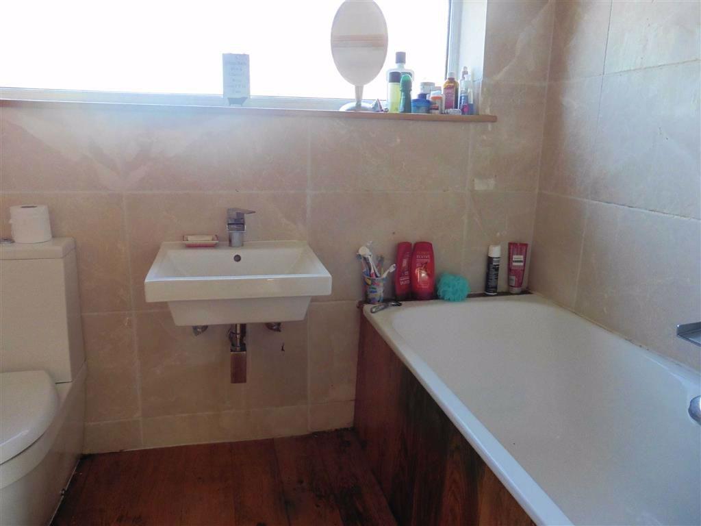 Luxury fully tiled  bathroom (side)