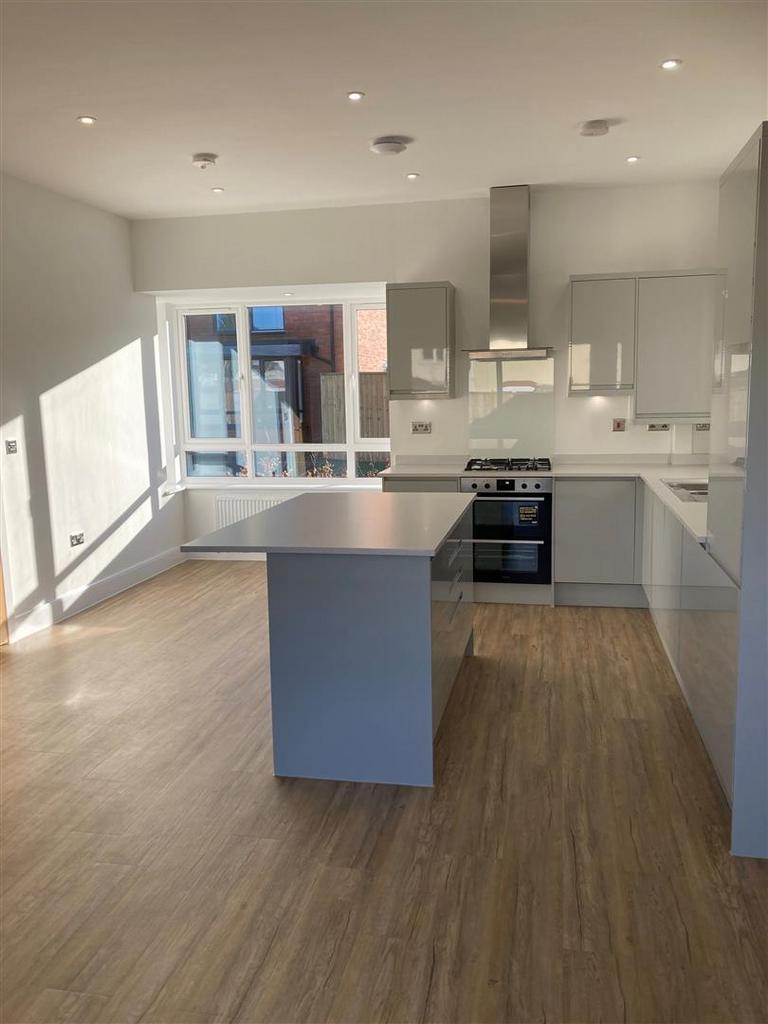 Plot 24 kitchen through to dining area.jpg