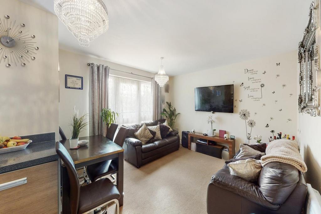 L Shaped reception room with Juliet balcony