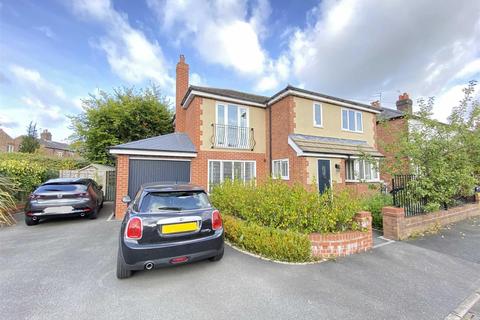 18 Beech Grove, Wilmslow, SK9 5EU
