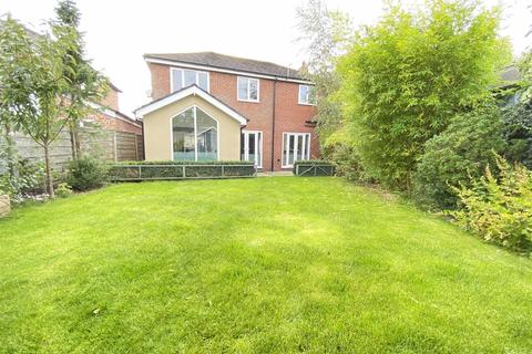 18 Beech Grove, Wilmslow, SK9 5EU