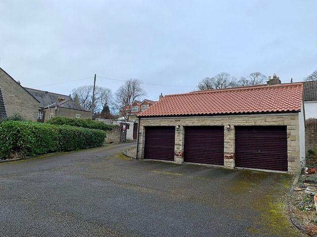 Triple Garage and Driveway