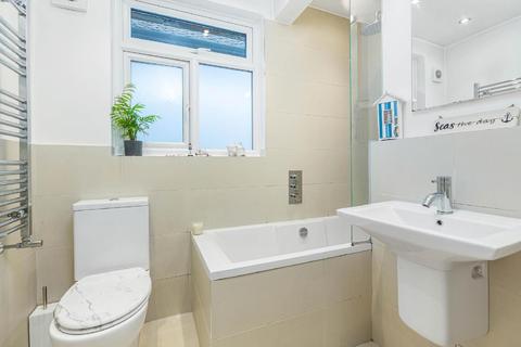67 Abbott Avenue, London, SW20 8SG