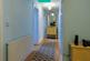 Hallway leading to office and bedroom Four