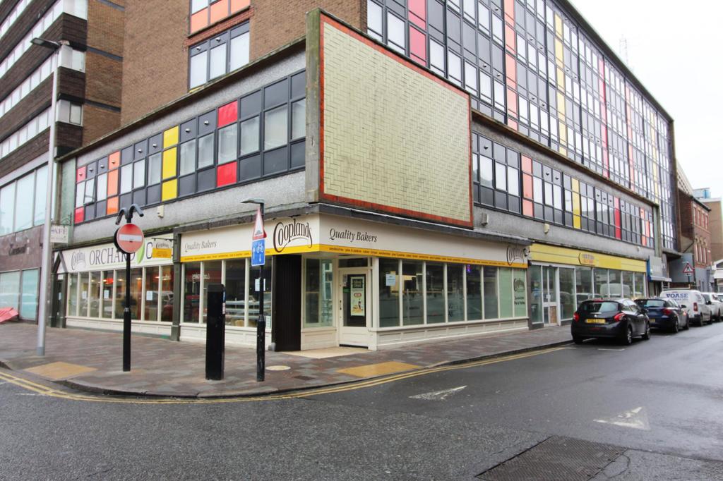 Block of four retail units for sale by auction