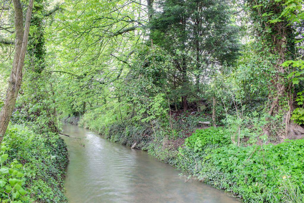 The Stream By The House...