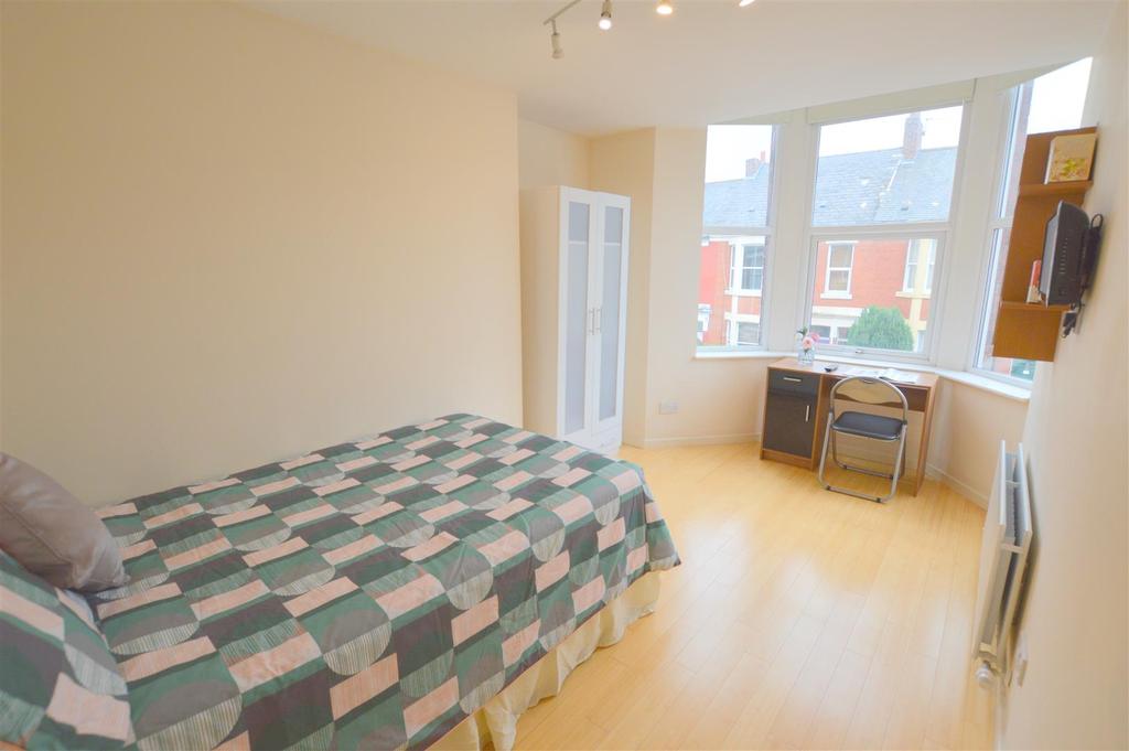 103 Tosson Terrace Orange Bedroom.jpg
