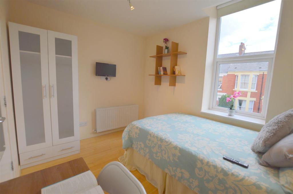 103 Tosson Terrace Blue Bedroom.jpg