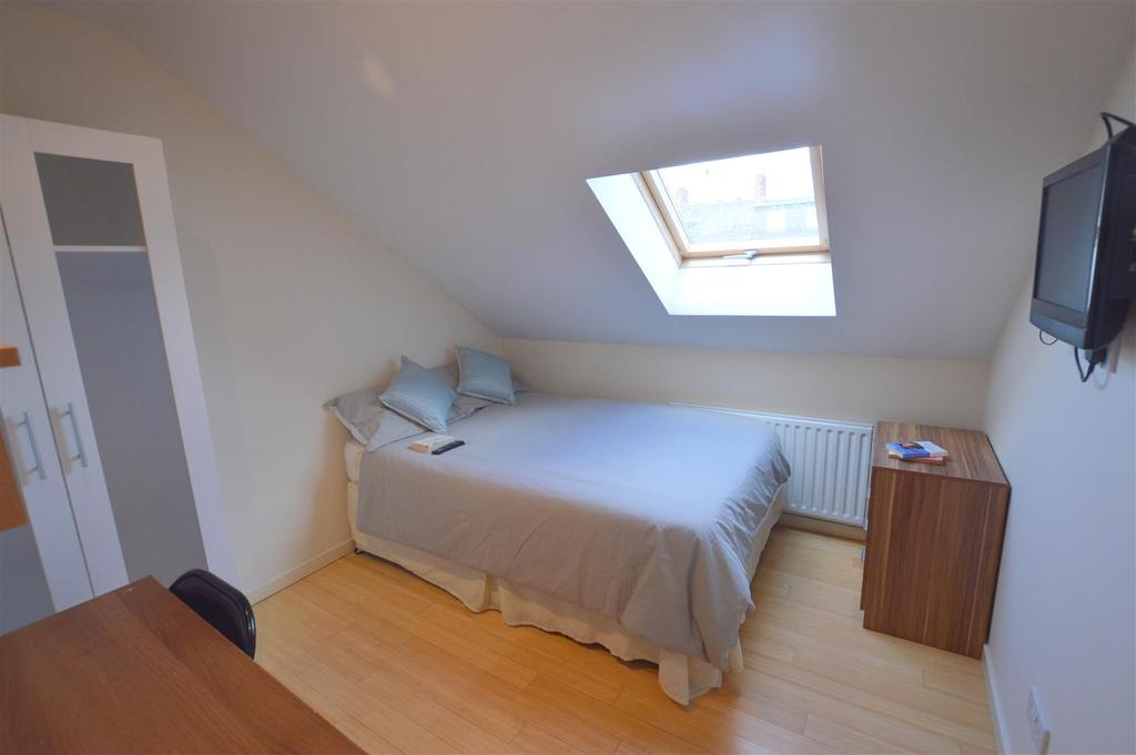 103 Tosson Terrace Green Bedroom.jpg
