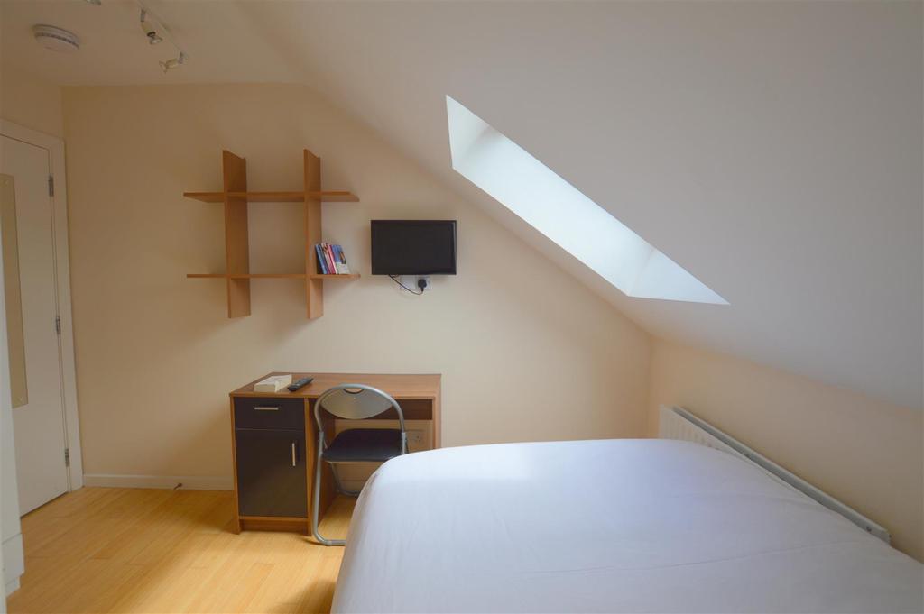 103 Tosson Terrace White Bedroom.jpg