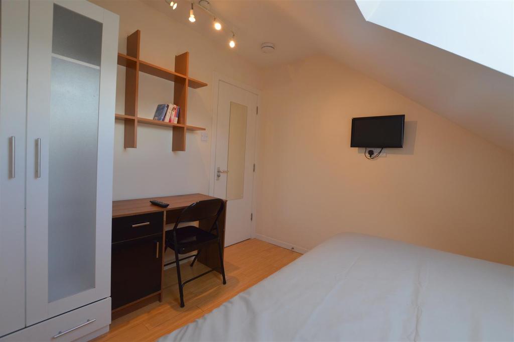 103 Tosson Terrace Black Bedroom.jpg