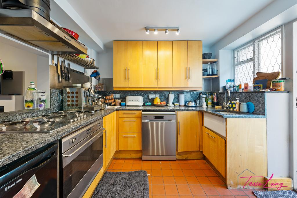 Fitted Kitchen with Door to Garden