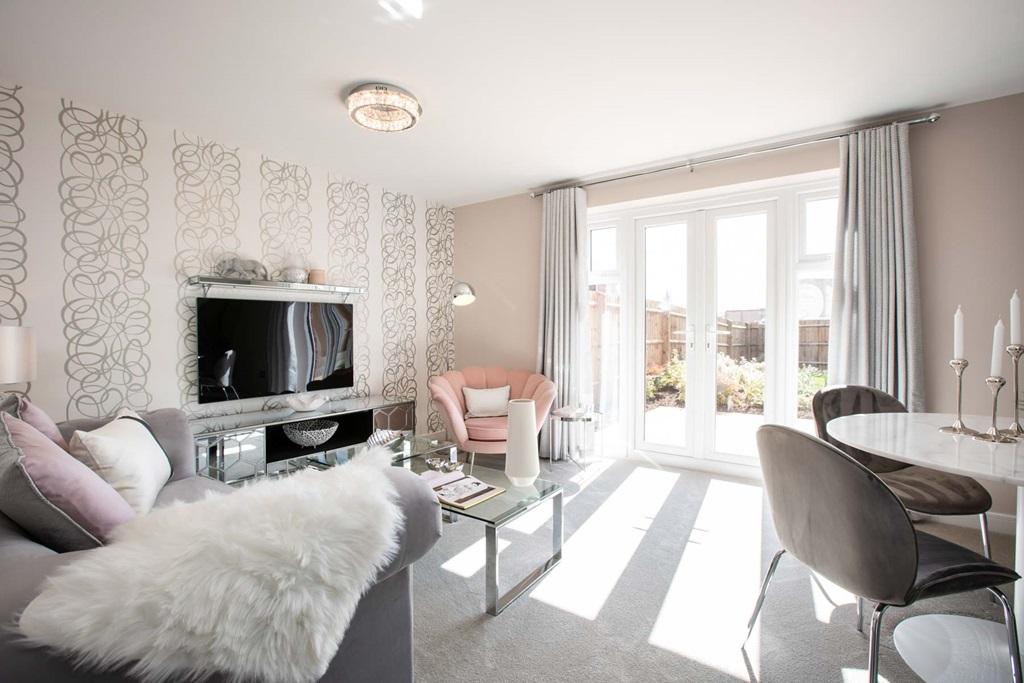 French doors to the rear garden make the lounge a bright space