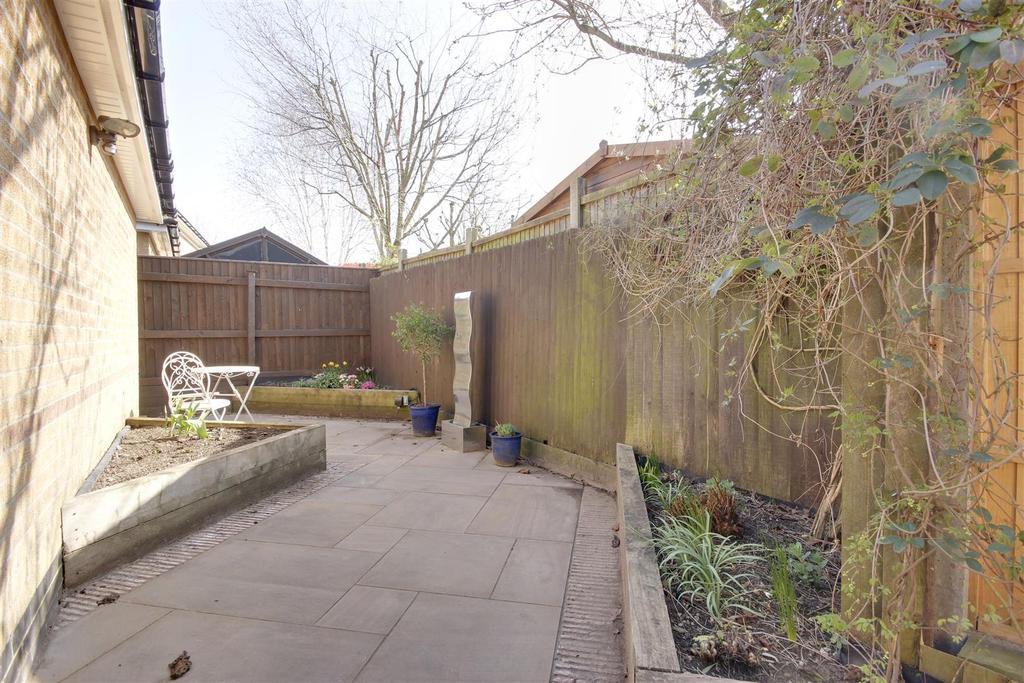 Patio to Rear of Garage