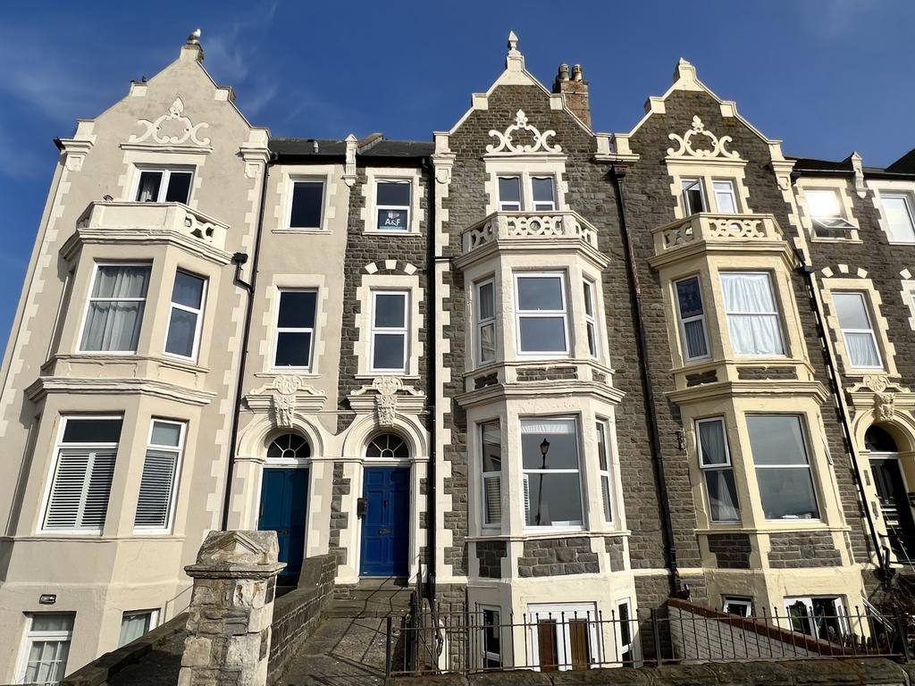 A 2 BEDROOM TOP FLOOR FLAT within a FOUR STOREY T