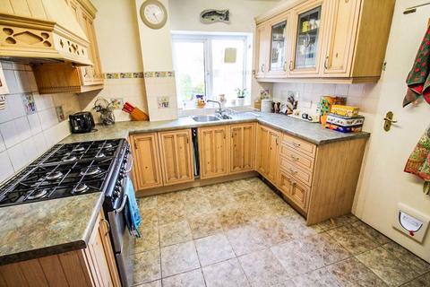 16 Buckingham Drive, Bury, BL8 2DH