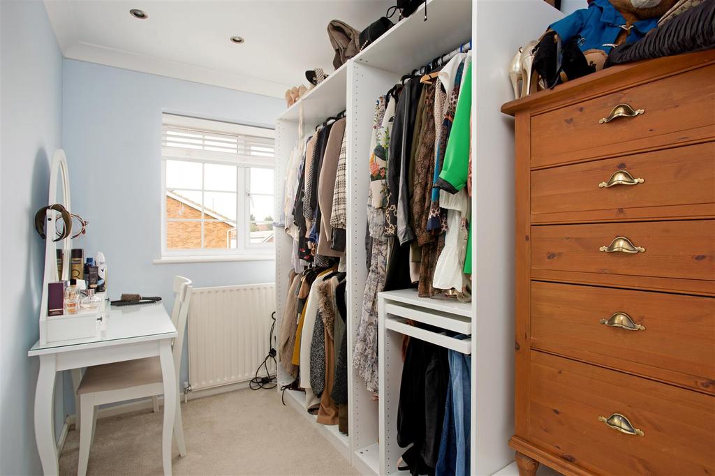 Bedroom Three - Walk in Wardrobe.jpg