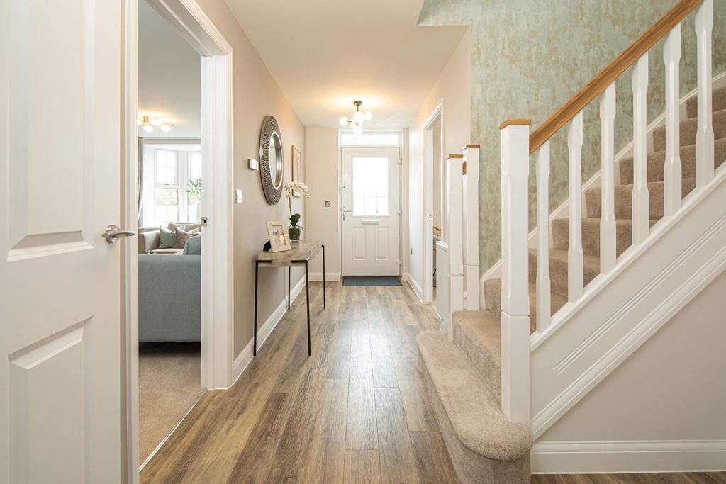 Hallway and stairs to the Holden 4 bedroom detached home