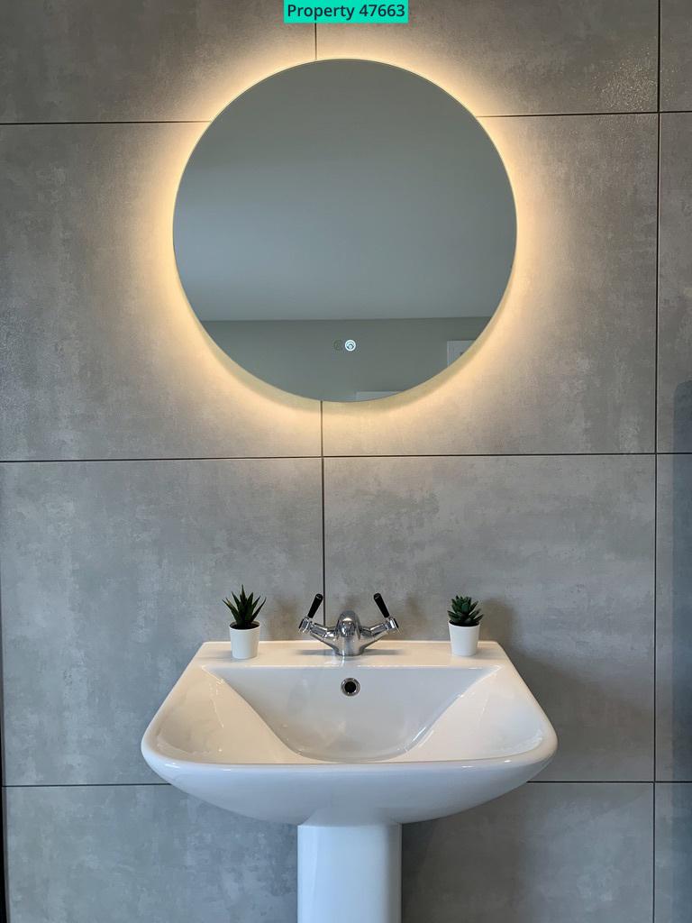Bathroom Sink and Mirror