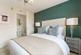 There's ample space in the main bedroom