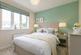 Bedroom 2 offers plenty of natural light