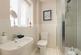 The main bedroom features an en suite shower room