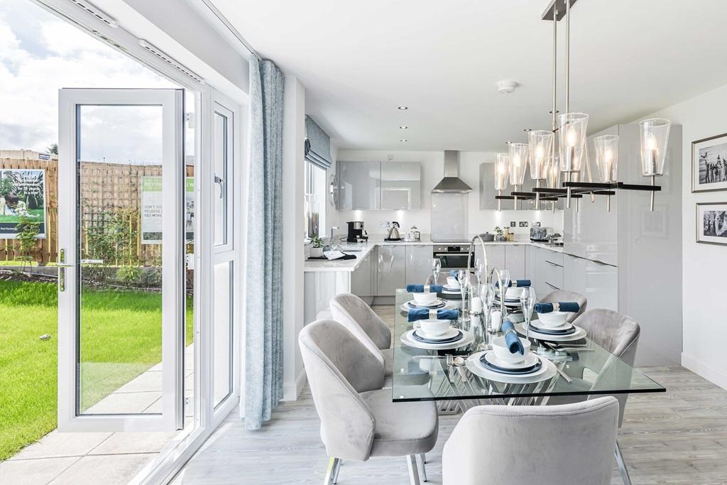 Kitchen/dining room with french doors leading to the garden of the 4 bed detached home, The Cullen