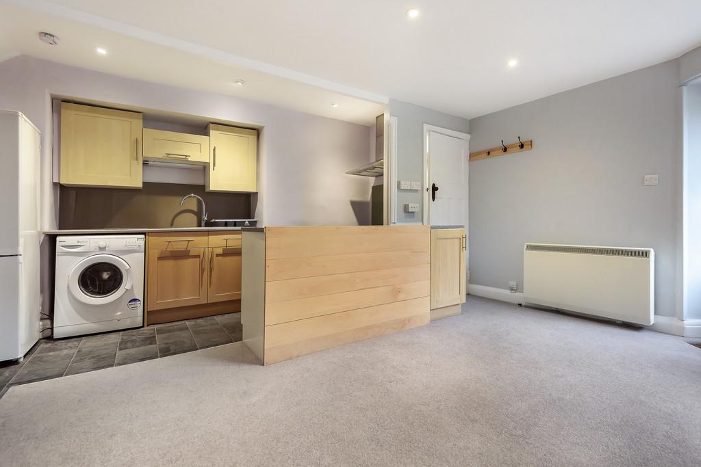 Sitting room with open plan kitchen