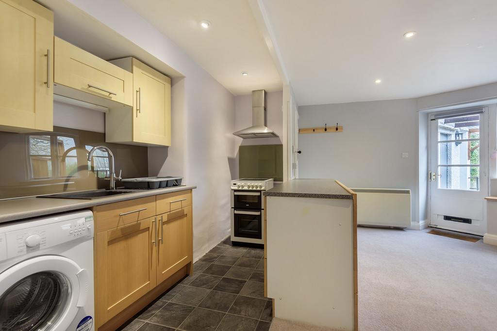 Sitting room with open plan kitchen