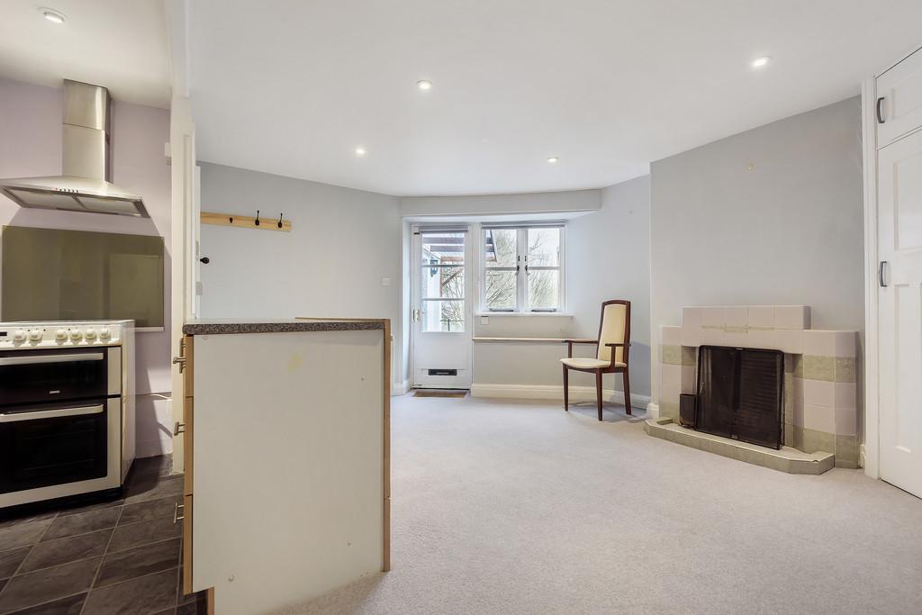 Sitting room with open plan kitchen