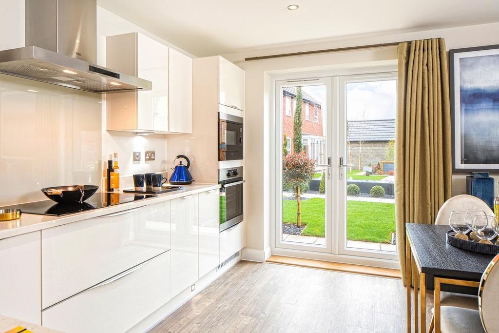 Open plan kitchen with French doors to the garden in the Ingleby 4 bedroom home