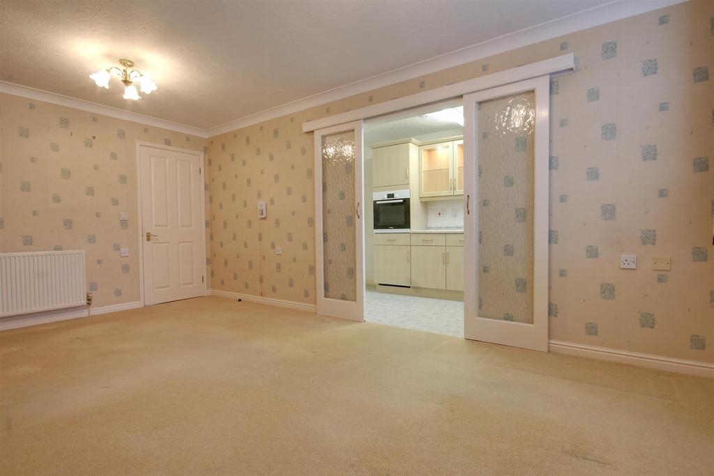 Doors opening in to the breakfast kitchen.